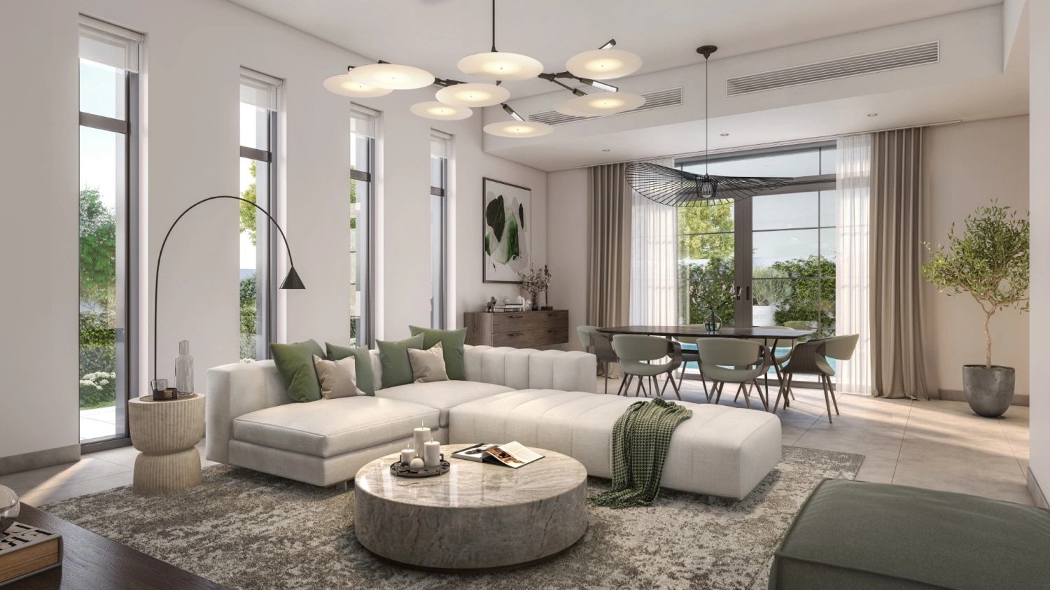 Open kitchen with modern fittings and a breakfast bar at Yas Park Views home